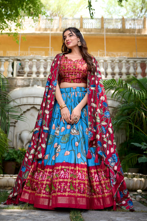 Lorenvalley Firozi Tussar Silk Pichwai With Patola Print And Zari Weaving Border Lehenga Choli with Dupatta