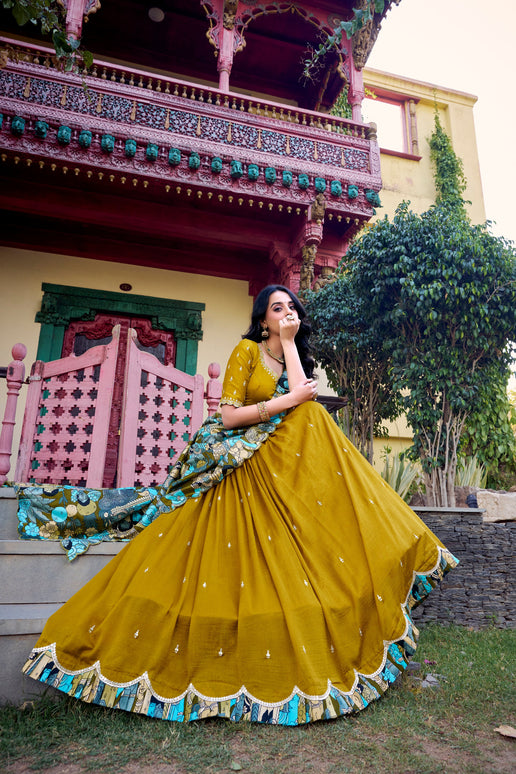 Lorenvalley Mustard Vichitra Silk Sequins and Thread Embroidery Work with Kalamkari Print Border Lehenga Choli with Dupatta