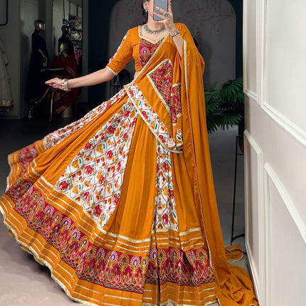 Lorenvalley Fashion Mustard Rayon with Printed Silk Patola Print with Gamthi Work and Lace Touch Up Lehenga Choli with Dupatta