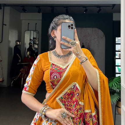 Lorenvalley Fashion Mustard Rayon with Printed Silk Patola Print with Gamthi Work and Lace Touch Up Lehenga Choli with Dupatta