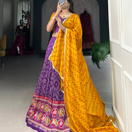 Lorenvalley Purple Tussar Silk Bandhej and Patola Print with Foil Work Lehenga Choli with Dupatta