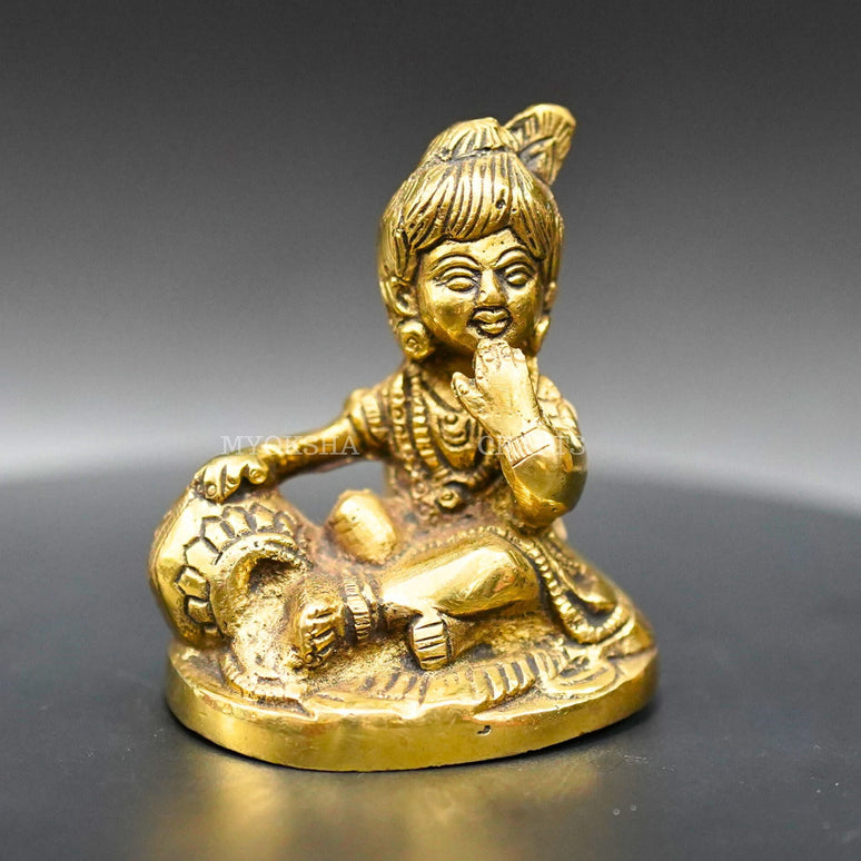Brass Mukhan Krishna Idol: A Divine Delight