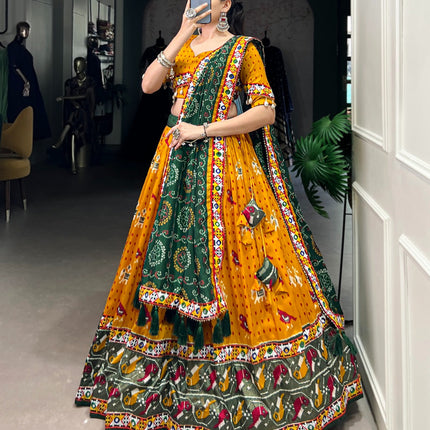 Lorenvalley Mustard Tussar Silk Patola Print with Gamthi Work Lace and Foil Work Lehenga Choli with Dupatta