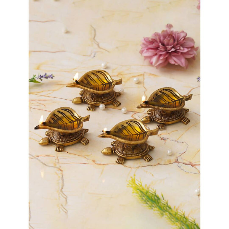 eCraftIndia 4 Pieces Beige Tortoise Statue Leaf Design Diyas