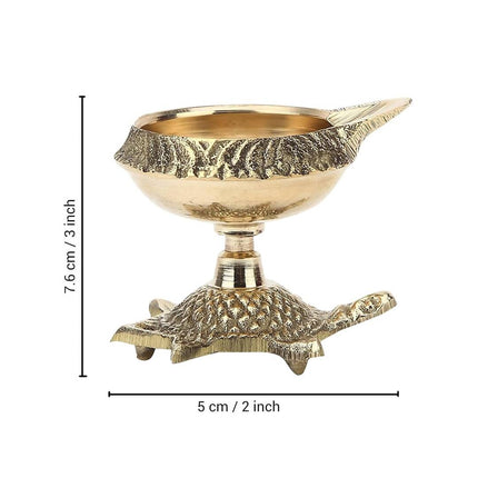 Tied Ribbons Gold Toned 8 Pieces Decorative Brass Diyas With Tortoise Base