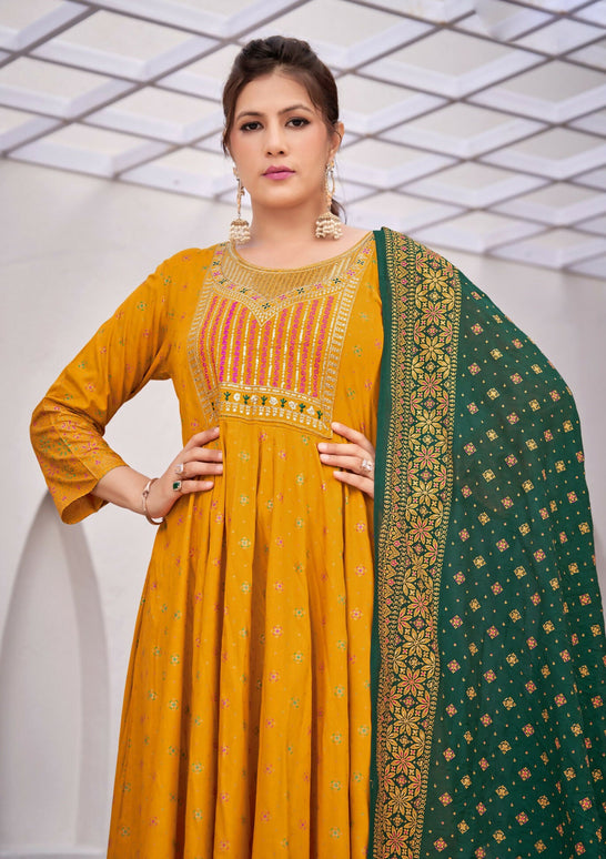 Aastha Fashion Yellow Rayon Party Wear Designer Gown Collection