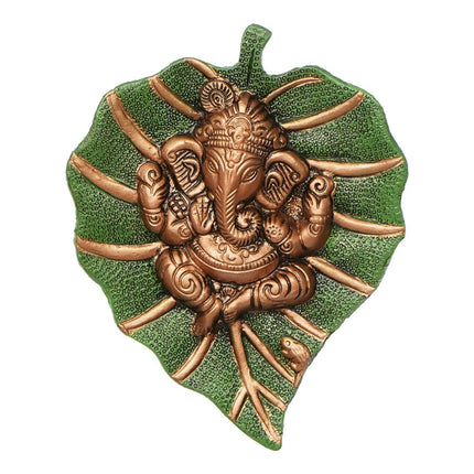 eCraftIndia Metal Golden Lord Ganesha On Green Leaf Wall Hanging Sculpture