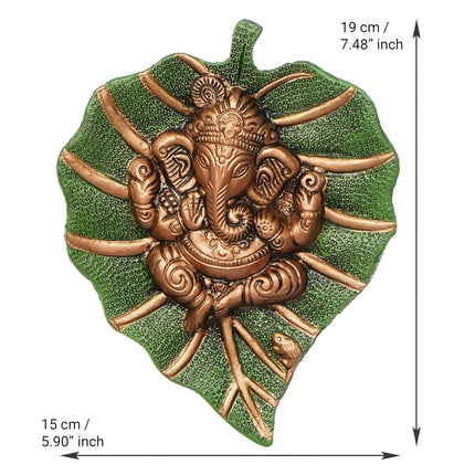 eCraftIndia Metal Golden Lord Ganesha On Green Leaf Wall Hanging Sculpture
